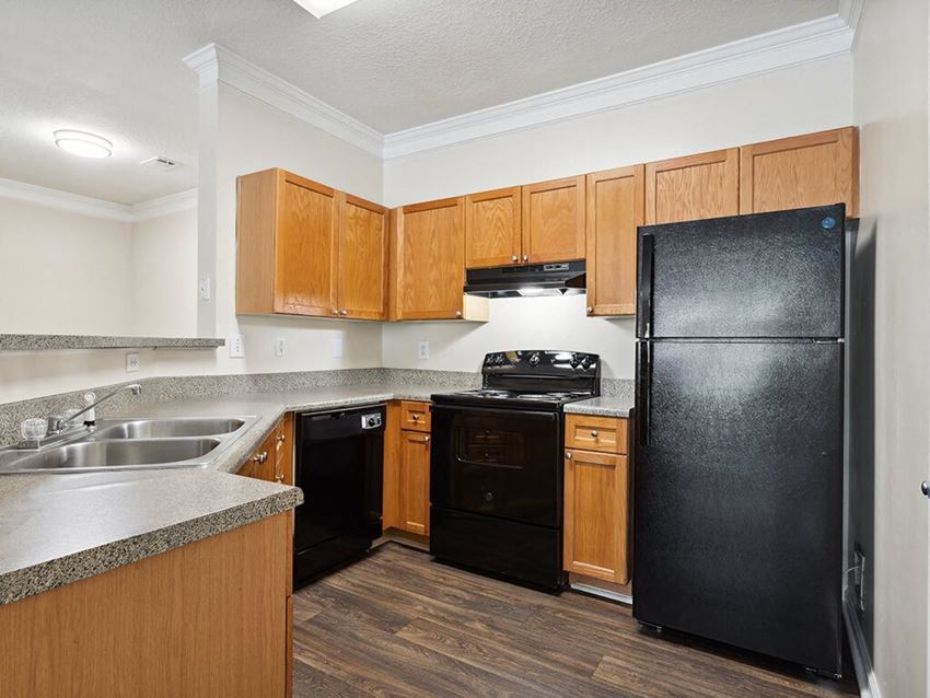 Kitchen with black appliances at Lakeside VIsta in Kennesaw GA