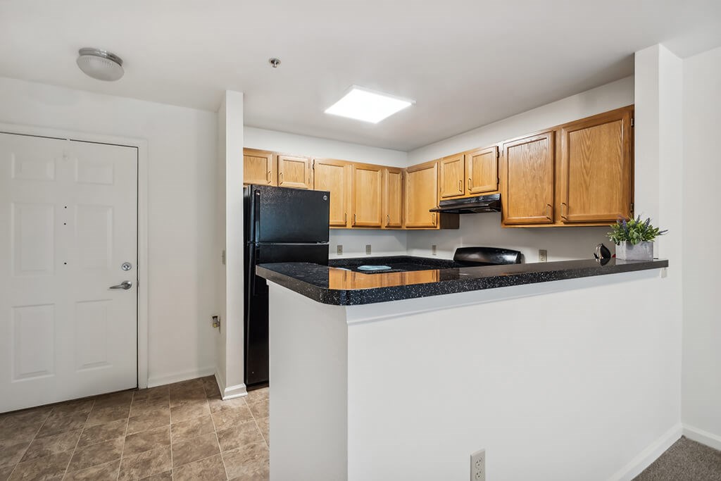Kitchen countertops at The Woods at Victoria Park Apartments in Woodbridge VA