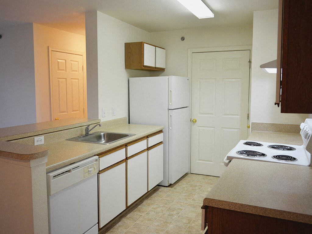 Kitchen area at Whispering Oaks Apartments in Portsmouth VA