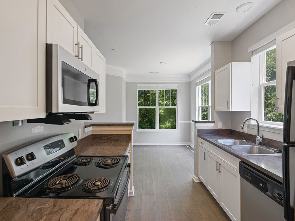 Kitchen stovetop at Falls Pointe Apartments in Durham NC