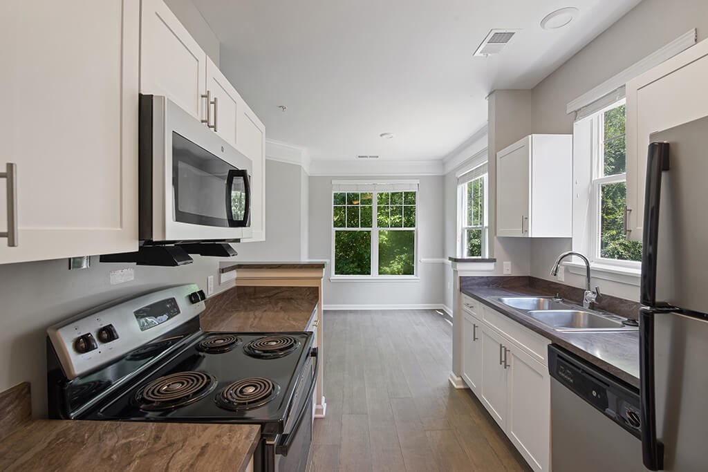 Kitchen stove at Falls Pointe at the Park Apartments in Durham NC