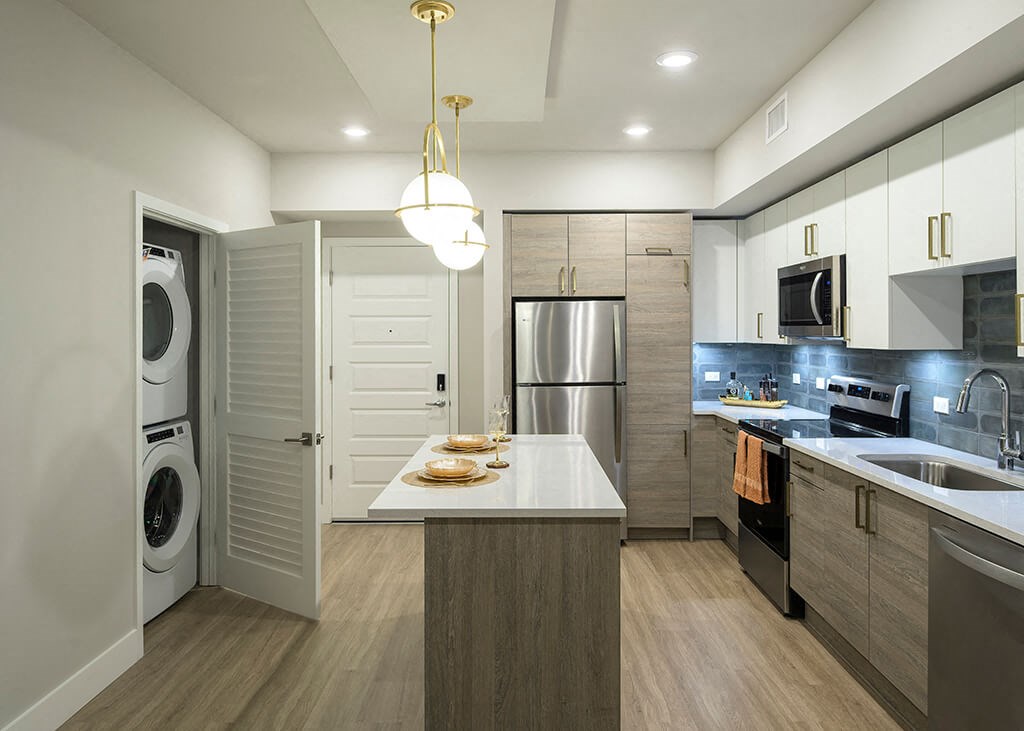 Kitchen with wooden floor at Treo Apartments in Fort Lauderdale FL