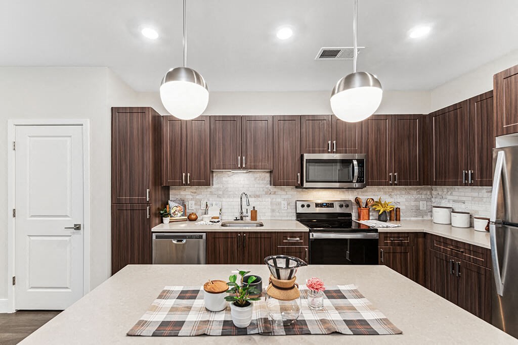 Kitchen with island seating at The Moxley in Fairfax VA
