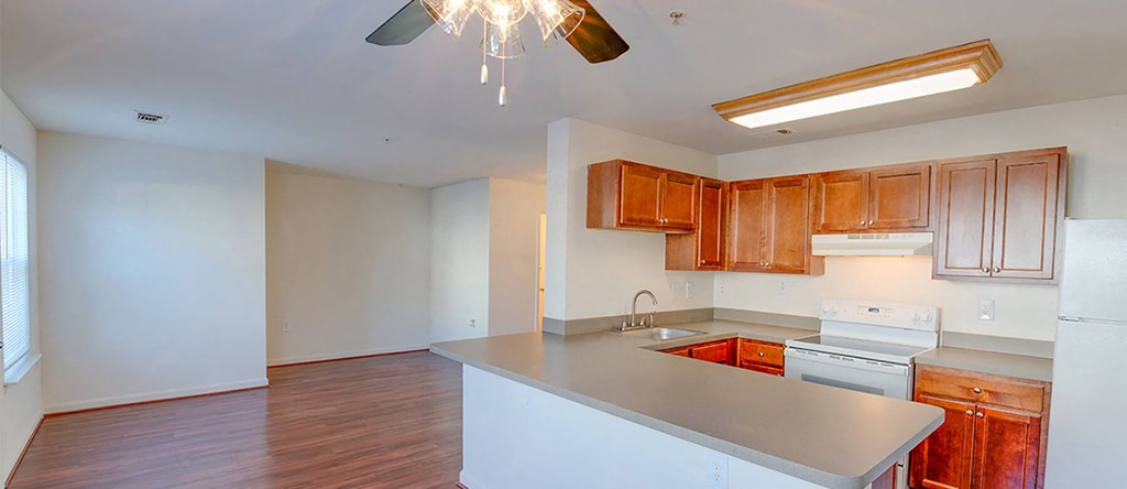 Kitchen with ceiling fan at Riverwoods, Riverwoods at Towne Square, and Riverwoods at Lake Ridge in Woodbridge VA