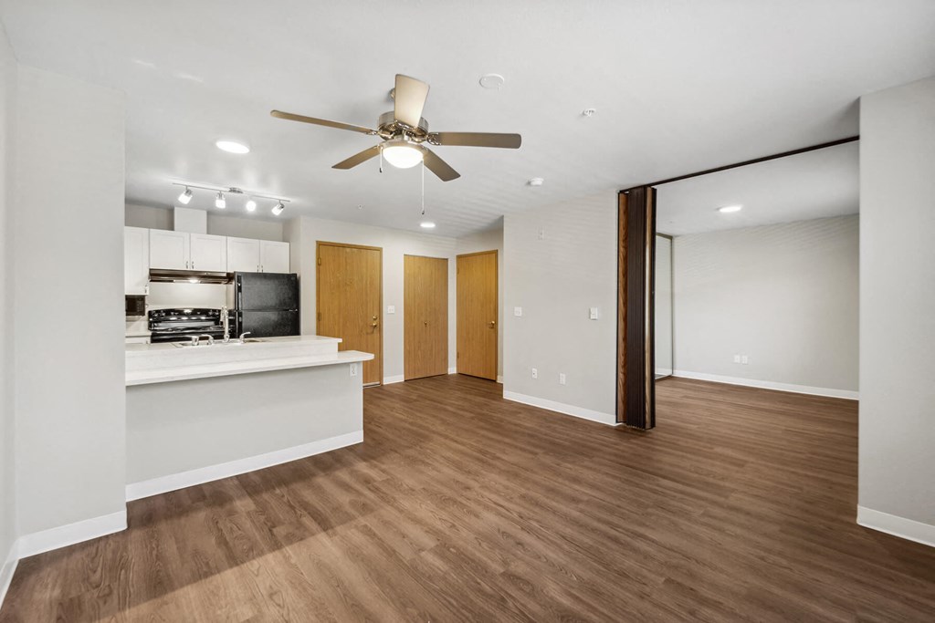 Kitchen and Living Room 2 at Auburn Court Apartments in Auburn WA