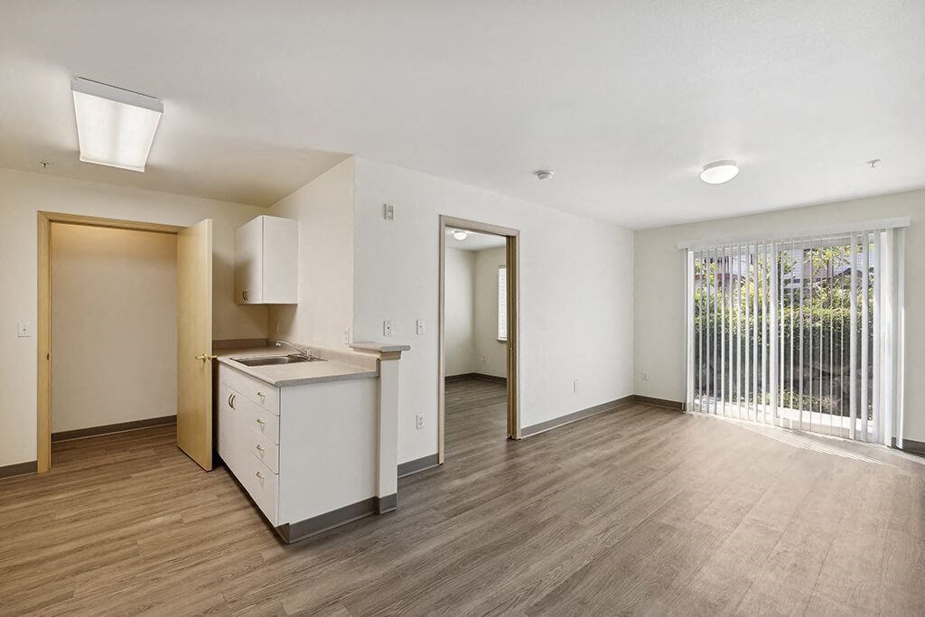 Kitchen and Living Room at Ballinger Court Senior Apartments in Edmonds, WA