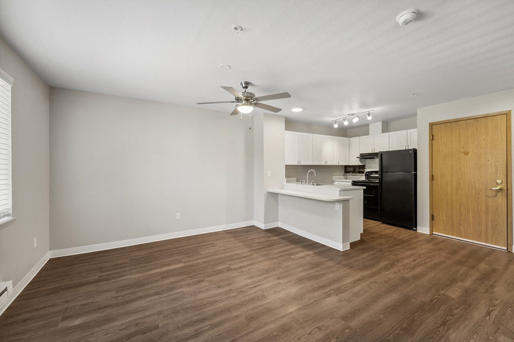 Kitchen and Living room at Auburn Court Apartments in Auburn WA