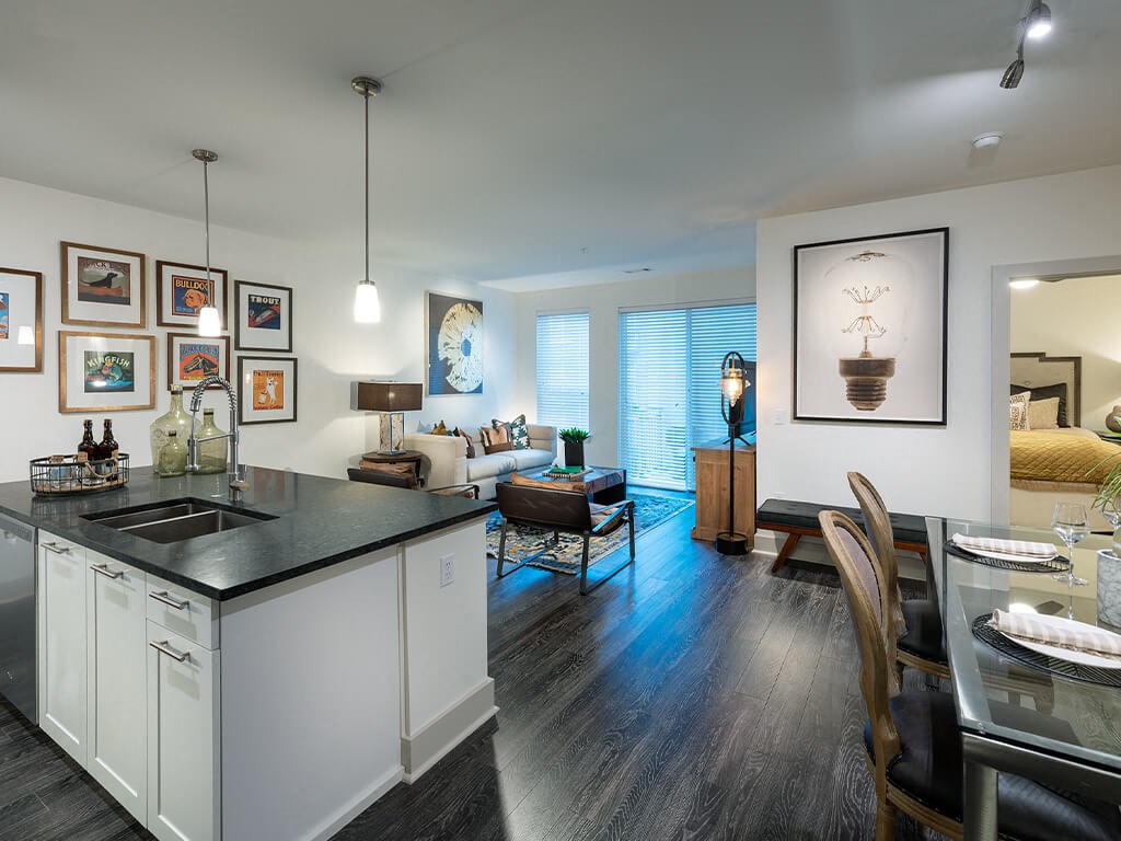 Kitchen with view of living room at Cirro King of Prussia Apartments in King of Prussia PA