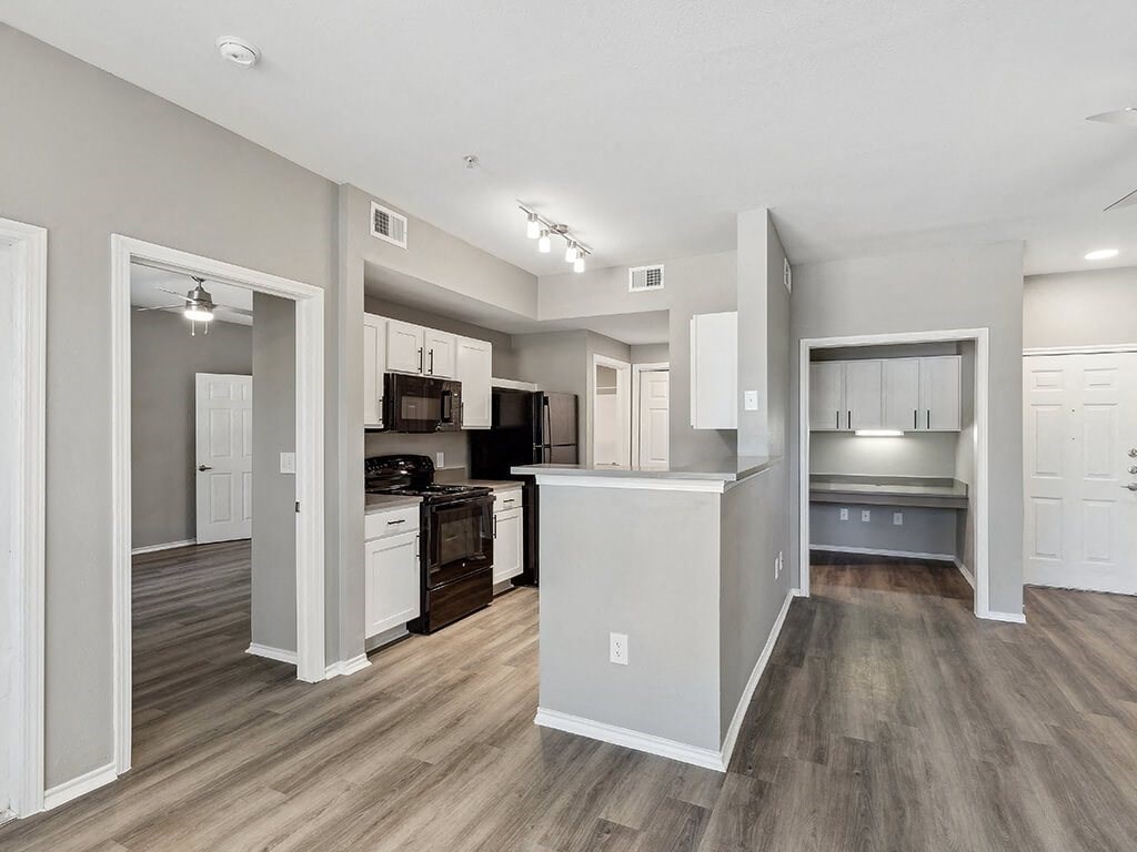Kitchen and Living room at The Sorento Apartments in San Antonio TX