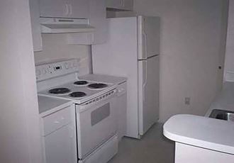Kitchen at Cedar Grove Apartments in Miami Gardens FL - Photo Gallery