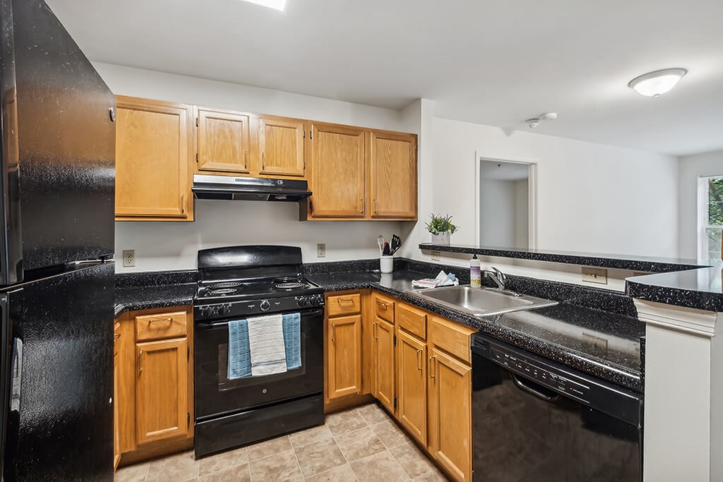 Kitchen at The Woods at Victoria Park Apartments in Woodbridge VA