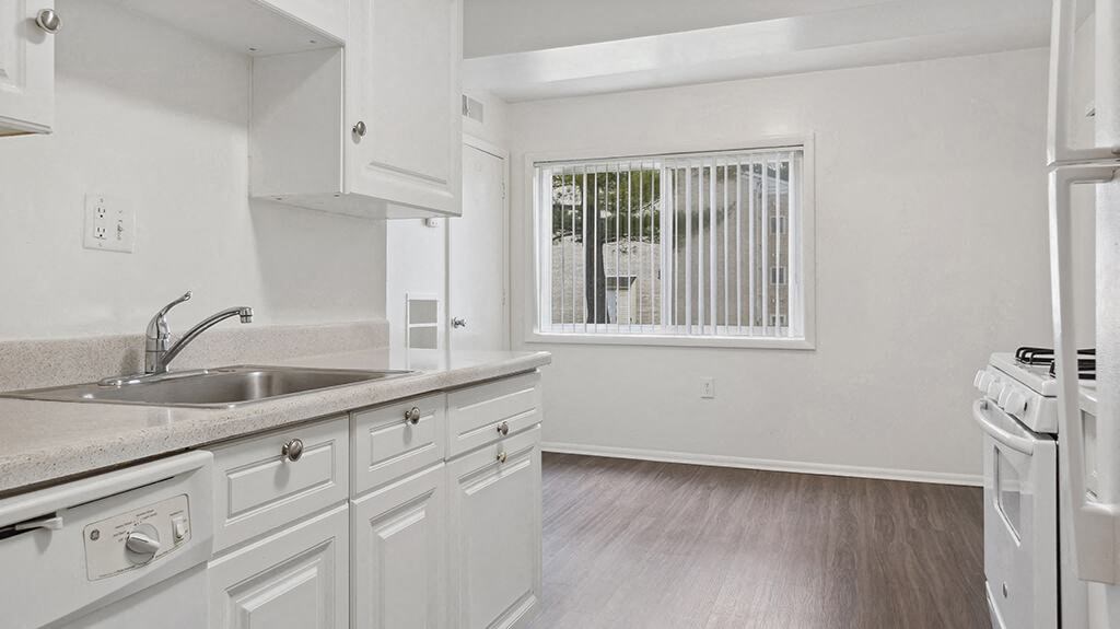 Kitchen with cabinetry at Oakfield Apartment Homes in Wheaton MD