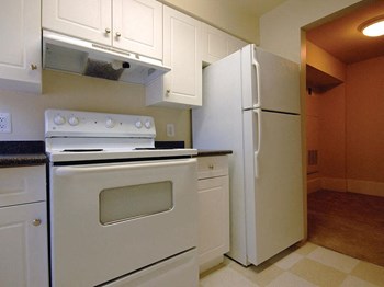 Kitchen at the Barrington Apartments in Silver Springs, MD - Photo Gallery 4