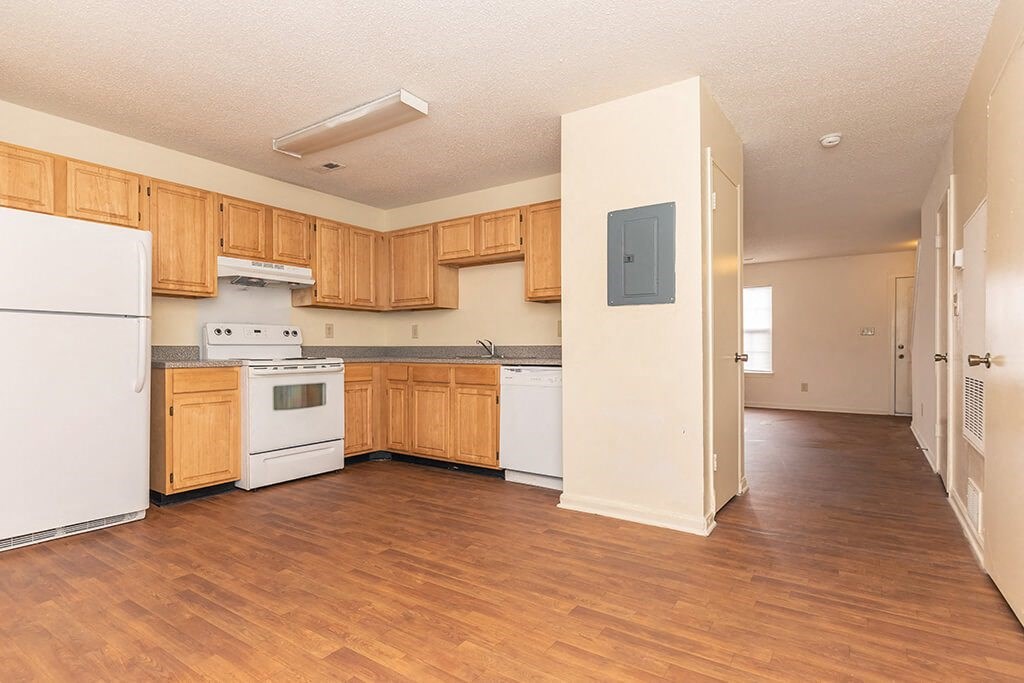 Kitchen with cabinets at Greens of Pine Glen in Durham NC