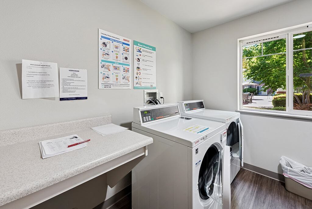 Laundry room at Lakewood Meadows Apartments in Lakewood WA