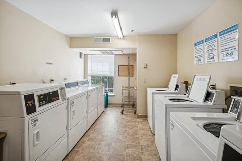 Laundry facilities at The Woods at Victoria Park Apartments in Woodbridge VA