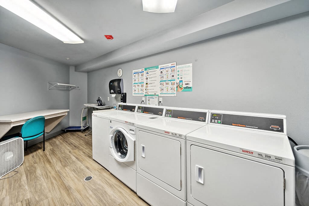 Laundry facilities at Woodlands at Forbes Lake Apartments in Kirkland WA