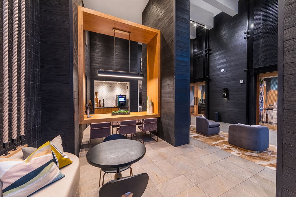 a living room with a couch and a table