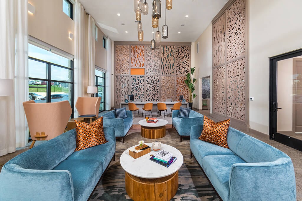 Leasing center couches at 1900 Parmer Apartments in Austin TX