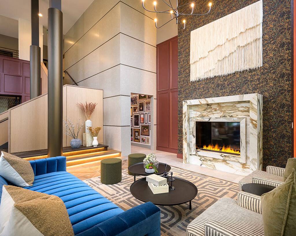 Leasing center fireplace and lounge at 333 Ellington Apartments in Gaithersburg MD