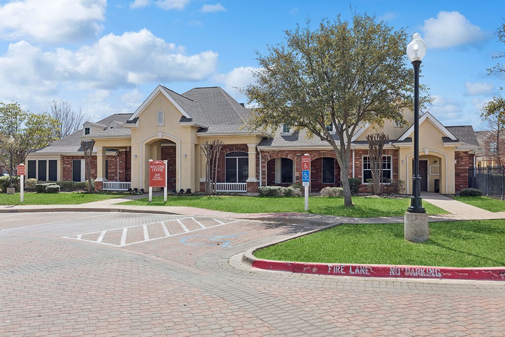 Leasing office exterior at Ironwood Crossing Apartments and Townhomes in Fort Worth TX