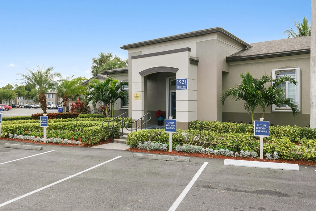 Exterior of leasing office at Brenton at Abbey Park Apartments in West Palm Beach FL