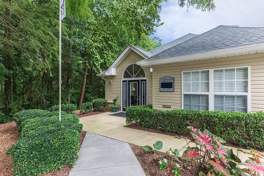 Leasing office exterior at Greens of Pine Glen in Durham NC