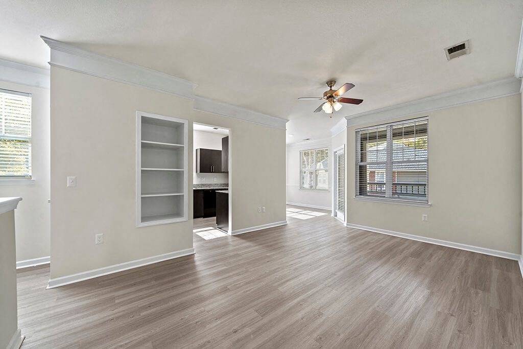 Living room with view of kitchen at Grand Oaks in Chester VA