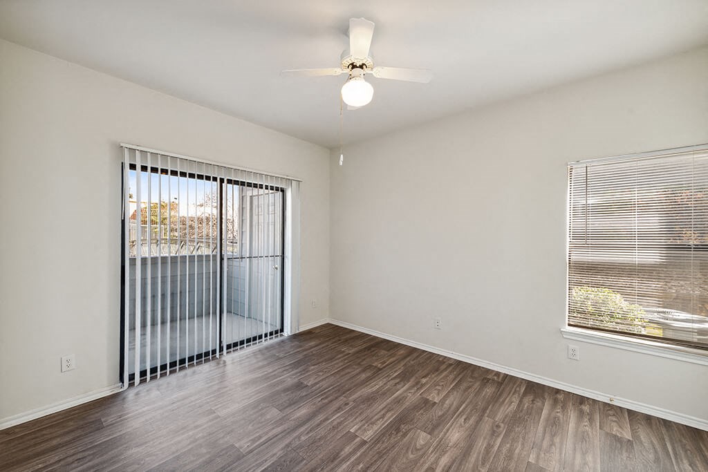 Living Room and Patio at Tivoli apartments in Dallas TX