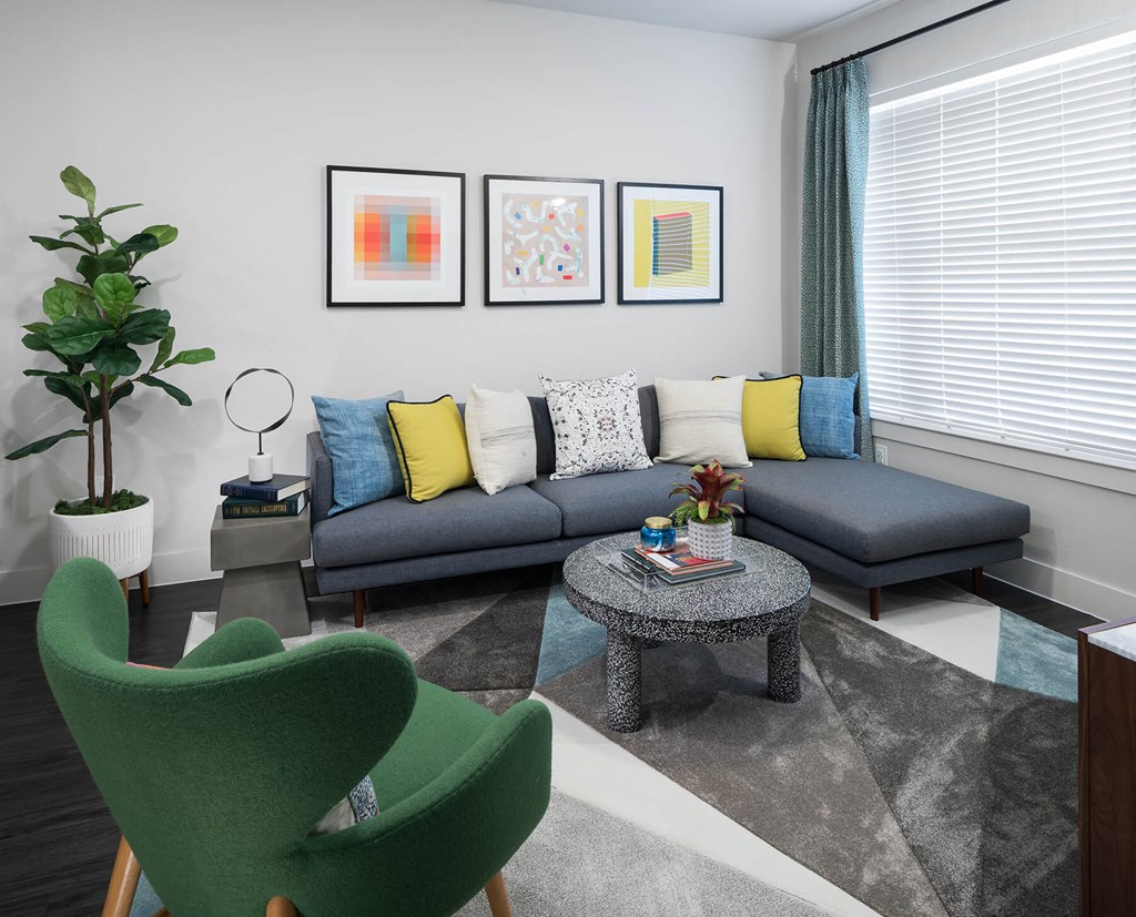 Living room seating at Jada Legacy Central Apartments in Plano TX