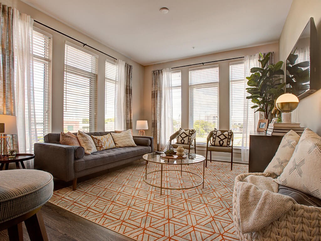 Living Room with large windows at Caroline Charleston SC