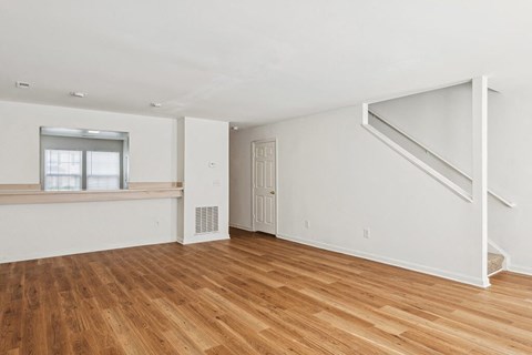 Living room with hardwood floor at Broadwater Townhomes in Chester VA