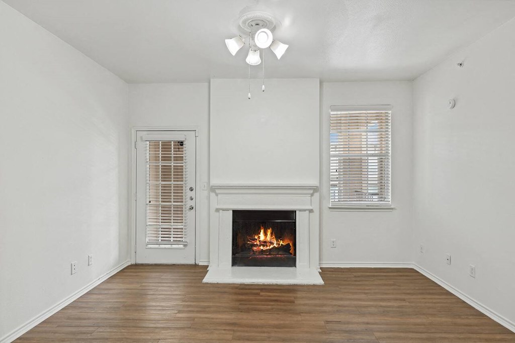 Living room with fire place at Cypress View Villa Apartments in Weatherford TX