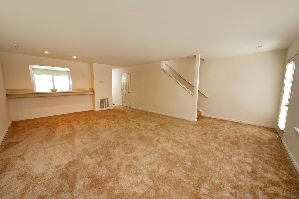 Spacious living room at Broadwater Townhomes in Chester, VA