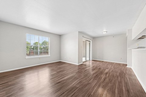 Living room and dining room at Valley Trails Apartments in Irving TX