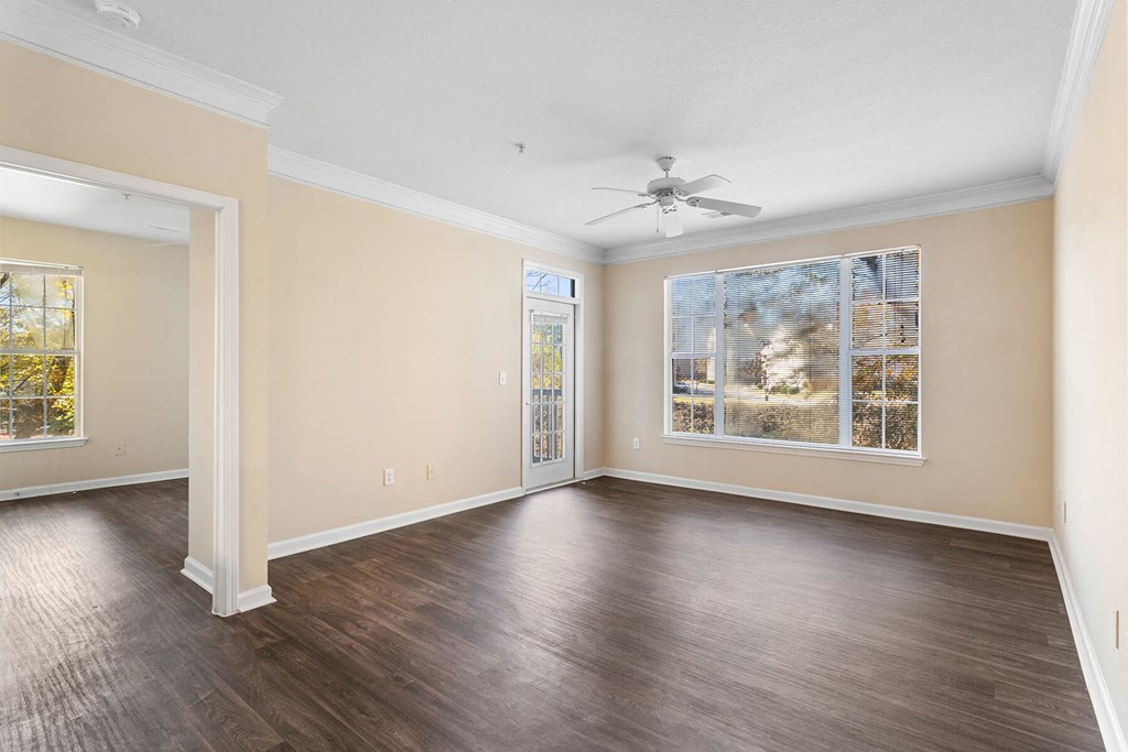Living room with hardwood flooring at Longwood Vista Apartments in Atlanta GA