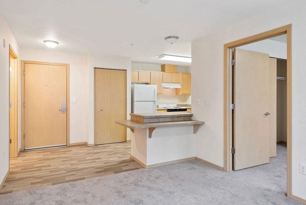 Living room and kitchen at Cedar Park in Seattle WA