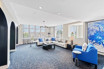 Resident lounge area at Bradley Braddock Road Station Apartments in Alexandria VA - Photo Gallery 16