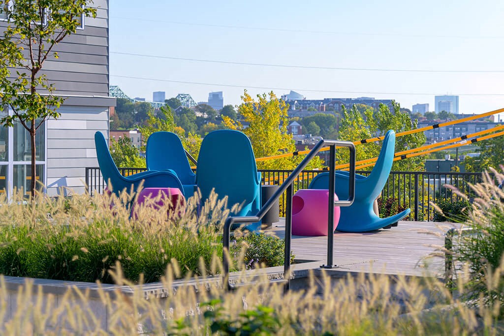 a group of chairs sitting on top of a deck
