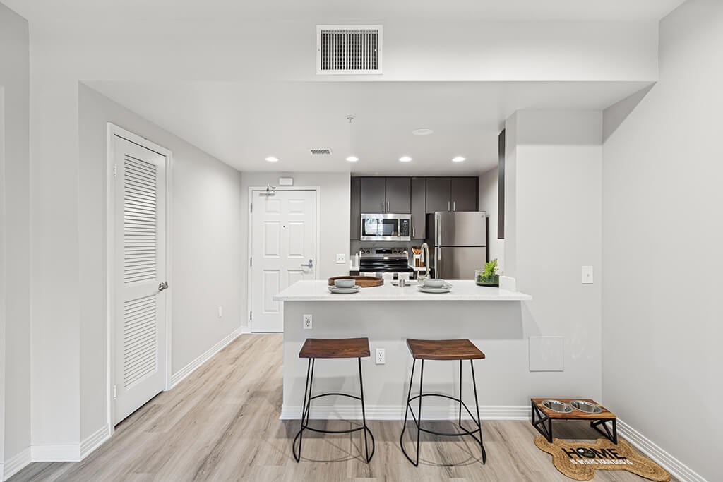 Kitchen breakfast bar at Haven at Del Mar Station in Pasadena CA