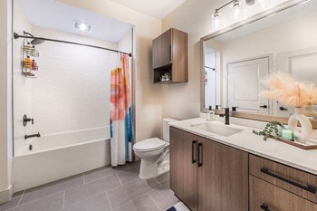 Model Bronze Finish Package Bathroom at Aura Apartment Homes in Orange CA - Photo Gallery 6