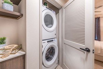Model Bronze Finish Package Washer and Dryer at Aura Apartment Homes in Orange CA - Photo Gallery 8