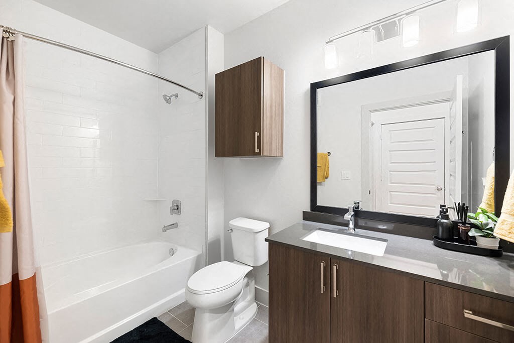 Model Concrete Design Package Bathroom at East Bend Apartments in Houston TX