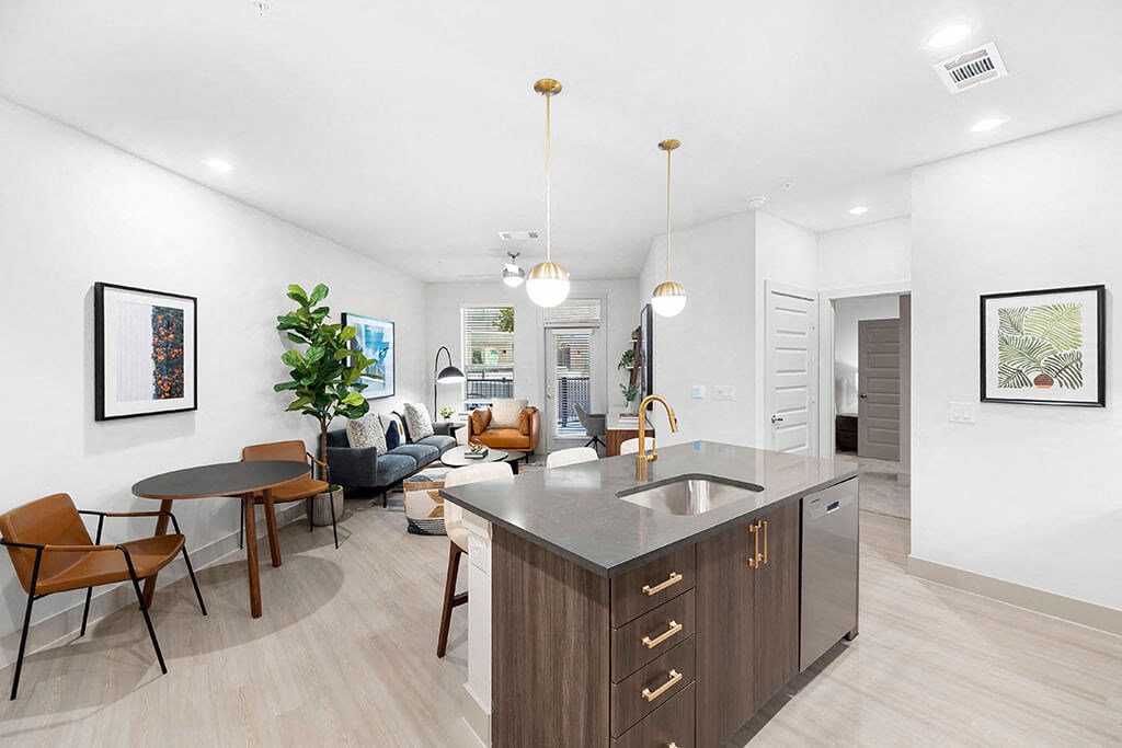 Model Concrete Design Package Kitchen Island at East Bend Apartments in Houston TX