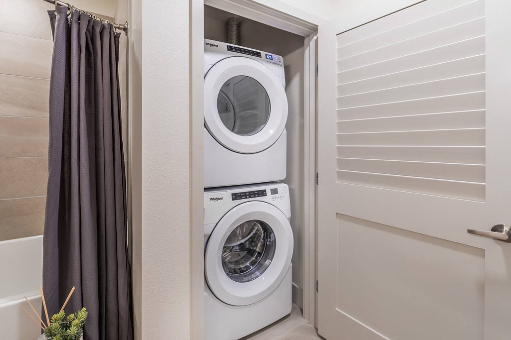 Stacked in unit Washer and Dryer at Aspect at Totem Lake Apartments in Kirkland WA