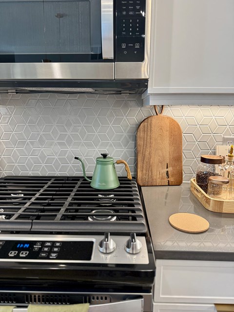 Geometric tile design backsplash at Heights at 1520 Apartments in Houston TX