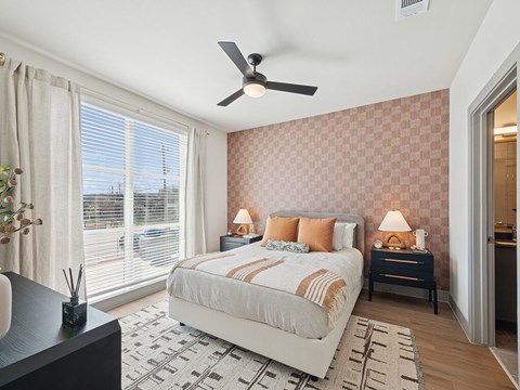 Bedroom with ceiling fan at Heights at 1520 Apartments in Houston TX