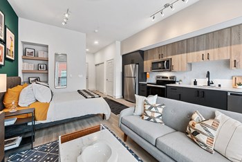 Living area and kitchen at Radiate Apartments in Redmond WA - Photo Gallery 2