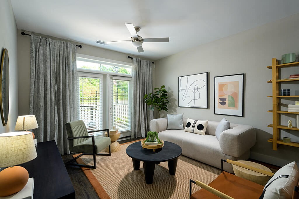 Living room with ceiling fan at Verge Apartments in Atlanta, GA