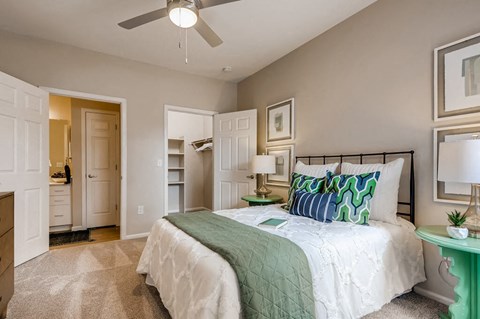 Bedroom with ceiling fan at Parkfield Apartment Homes in Denver CO